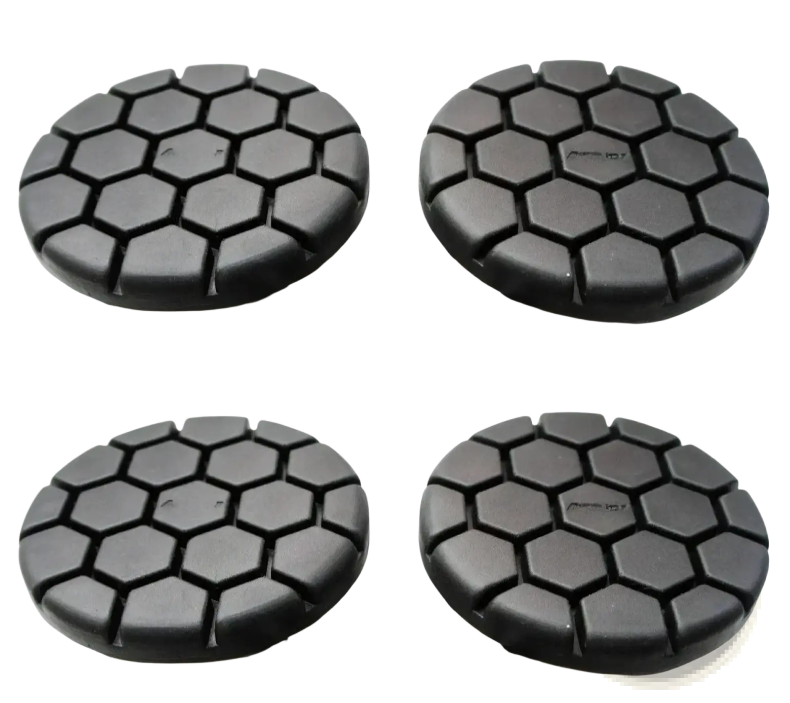 Black hexagonal-patterned car wheel covers designed for durability and style in automotive use