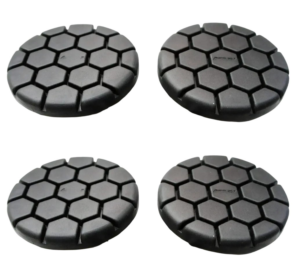 Black hexagonal-patterned car wheel covers designed for durability and style in automotive use