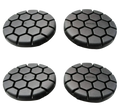 Black hexagonal-patterned car wheel covers designed for durability and style in automotive use