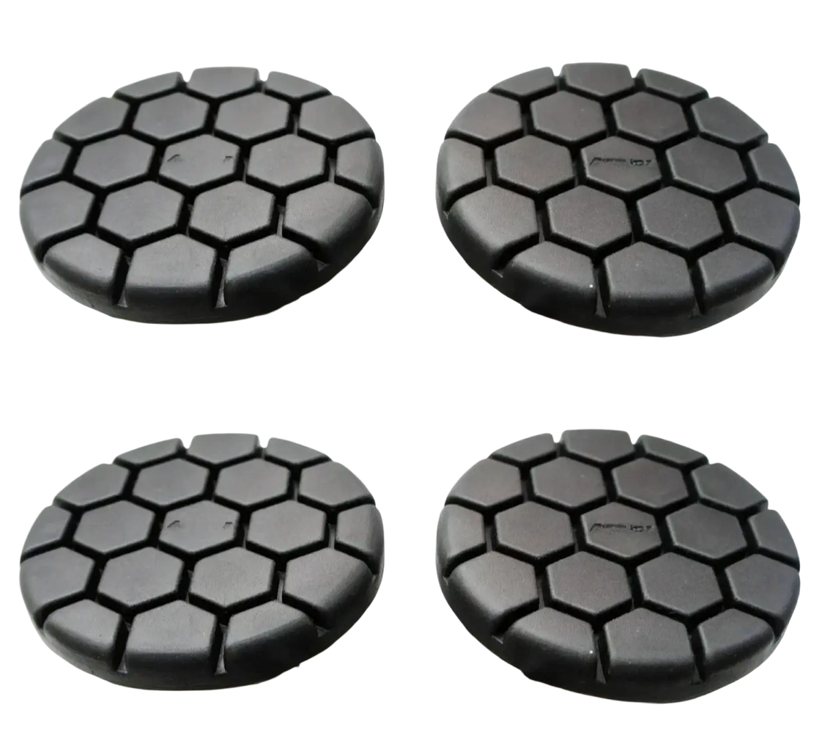 Black hexagonal-patterned car wheel covers designed for durability and style in automotive use