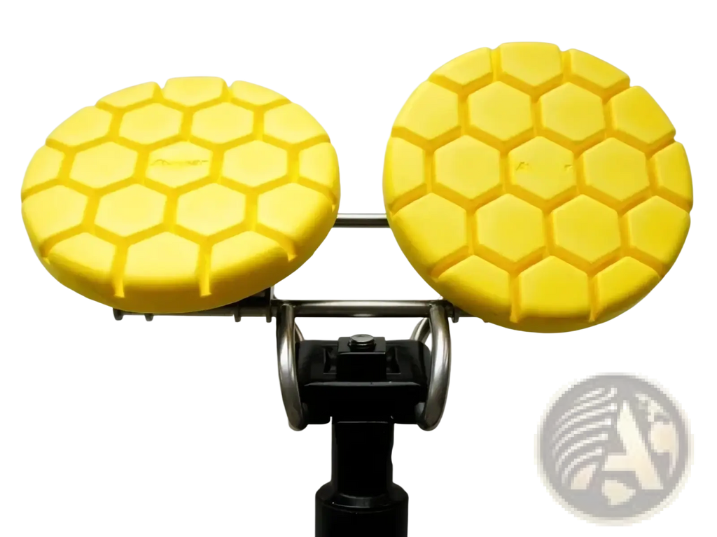 Bright yellow hexagonal patterned polishing pads mounted on metal frame for noseless ergonomic long distance bicycle saddle