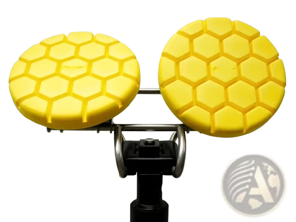 Bright yellow hexagonal patterned polishing pads mounted on metal frame for noseless ergonomic long distance bicycle saddle