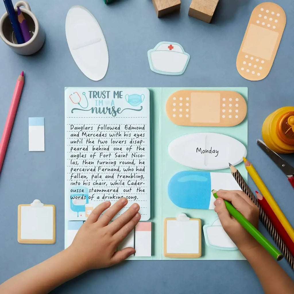Light blue nurse-themed planner with adhesive bandage and pill-shaped sticky notes in nurse sticky notes set medical stationery gift