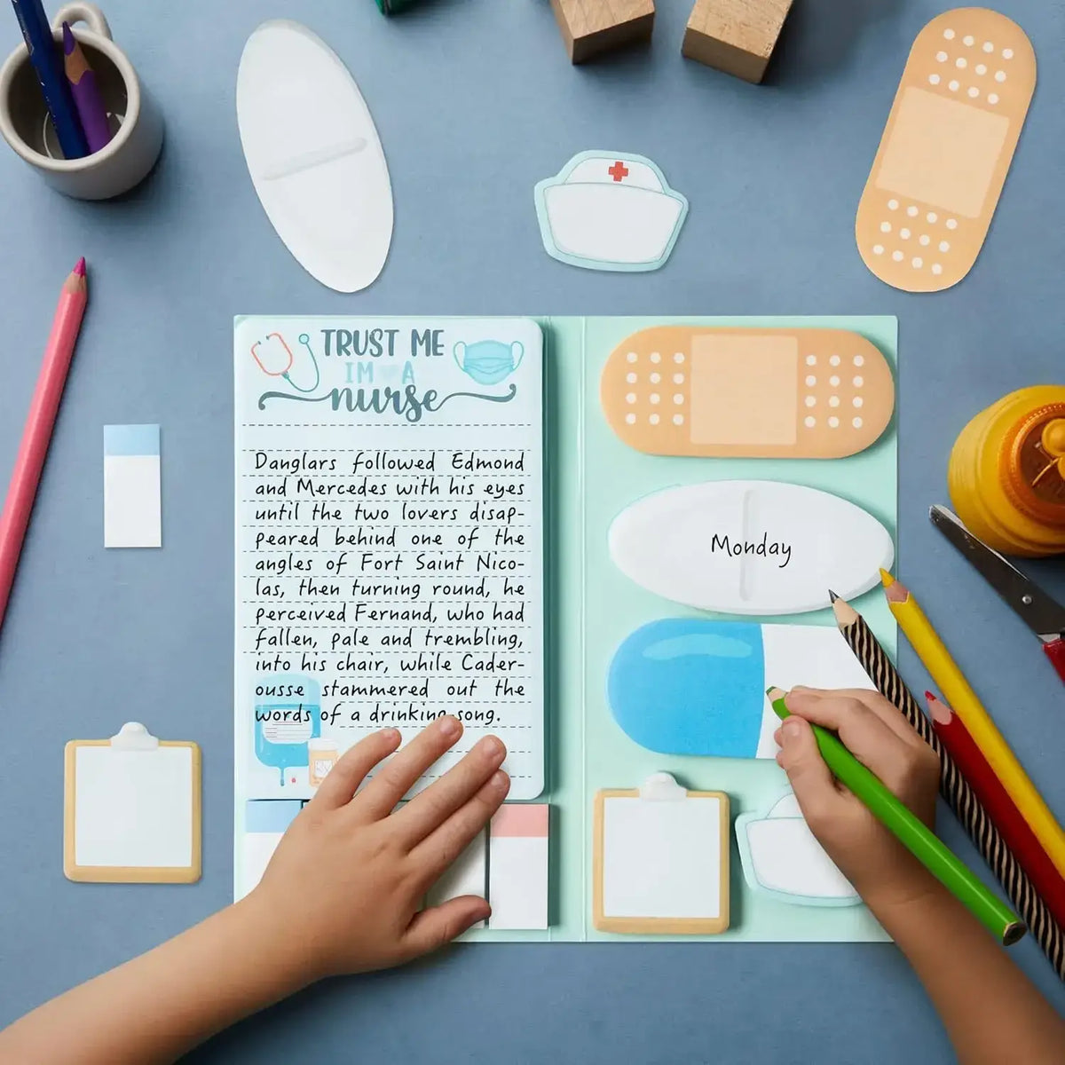Light blue nurse-themed planner with adhesive bandage and pill-shaped sticky notes in nurse sticky notes set medical stationery gift