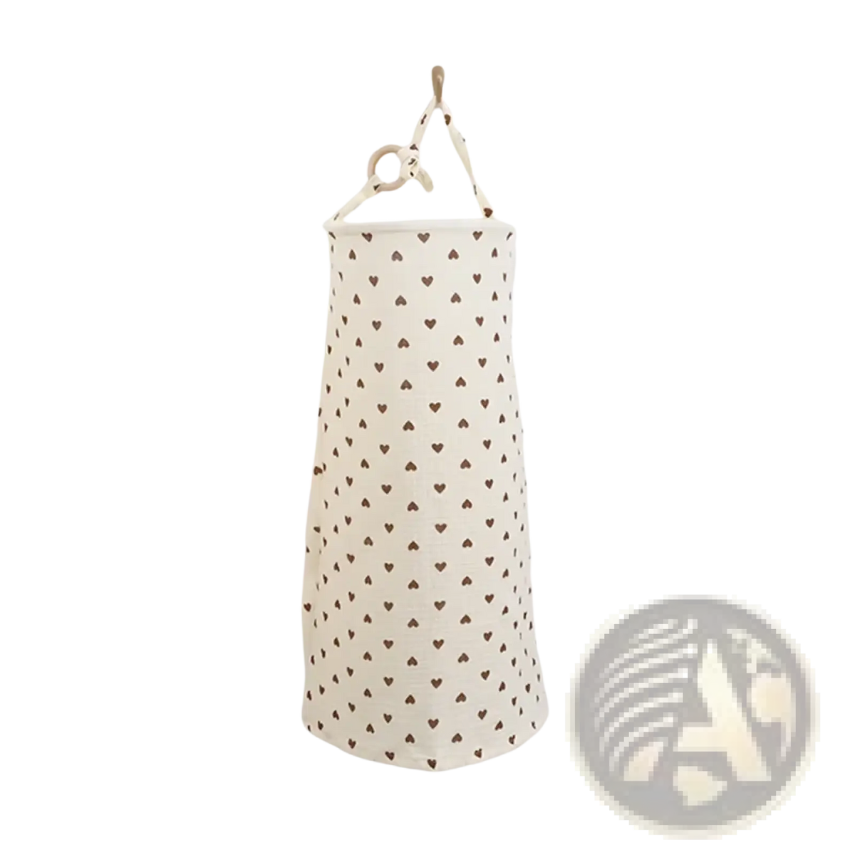 A cream-colored cotton nursing cover storage bag with small brown hearts and a wooden ring handle