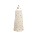 A cream cotton laundry hamper with pink bunny pattern hanging on wall paired with a breathable nursing cover dinosaur print