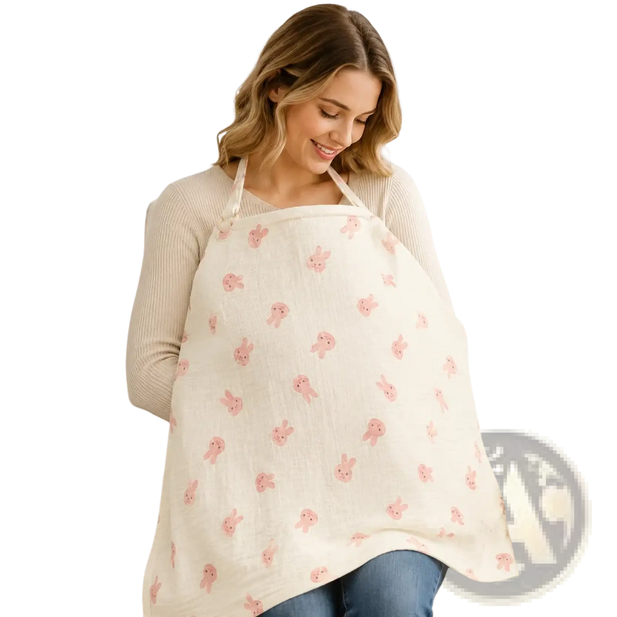 A soft off-white cotton nursing cover with a breathable fabric featuring a gentle pattern of pink cartoon bunnies