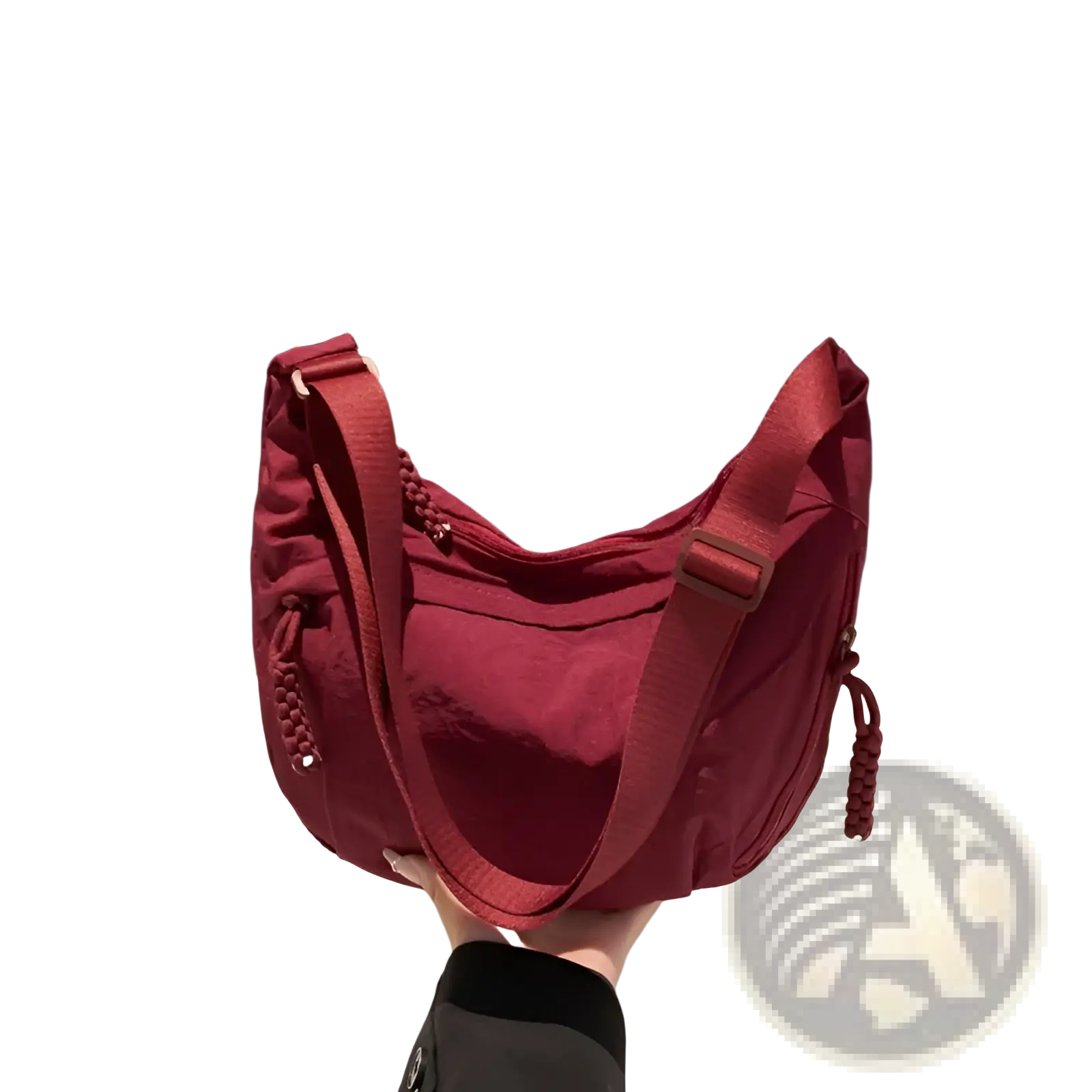 A vibrant red nylon crossbody bag with braided tassels and adjustable strap for large capacity hobo shoulder use