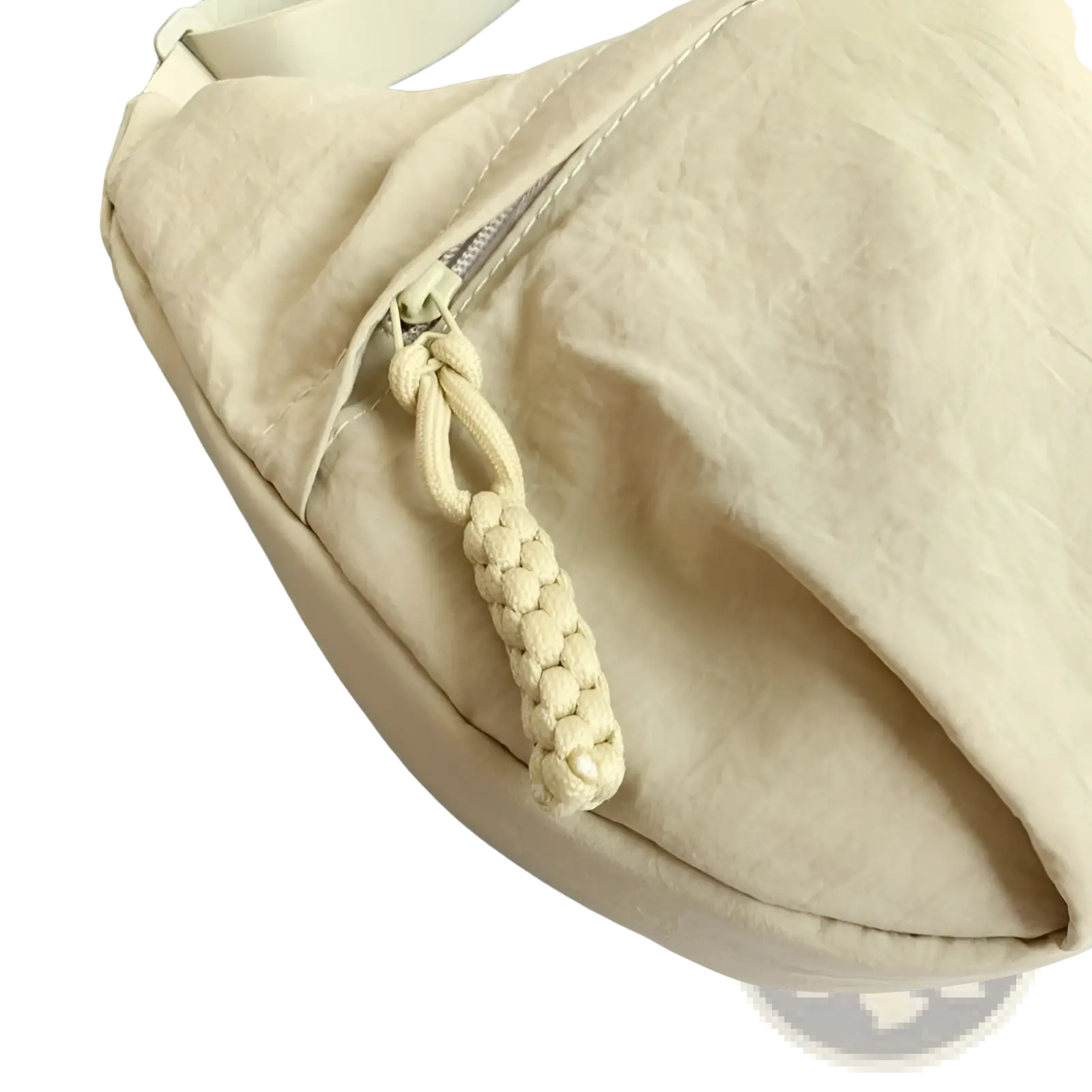 Beige nylon crossbody bag with large capacity and braided cord zipper pull for hobo shoulder use
