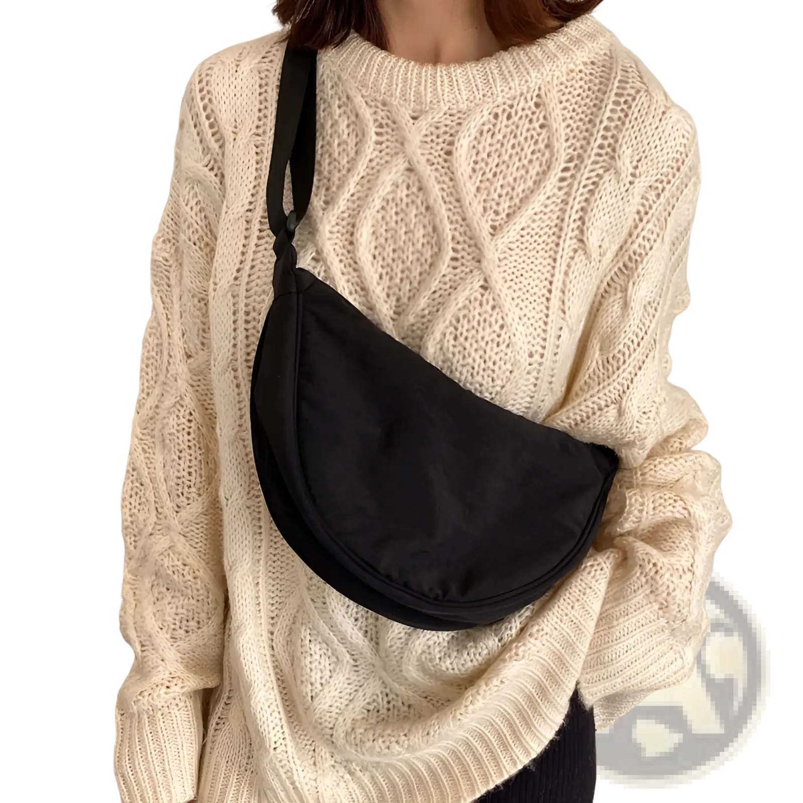 Black nylon dumpling messenger bag with curved crossbody design and adjustable strap for versatile wear
