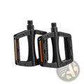 Black nylon mountain bike pedals with orange reflective strips on the sides for enhanced visibility