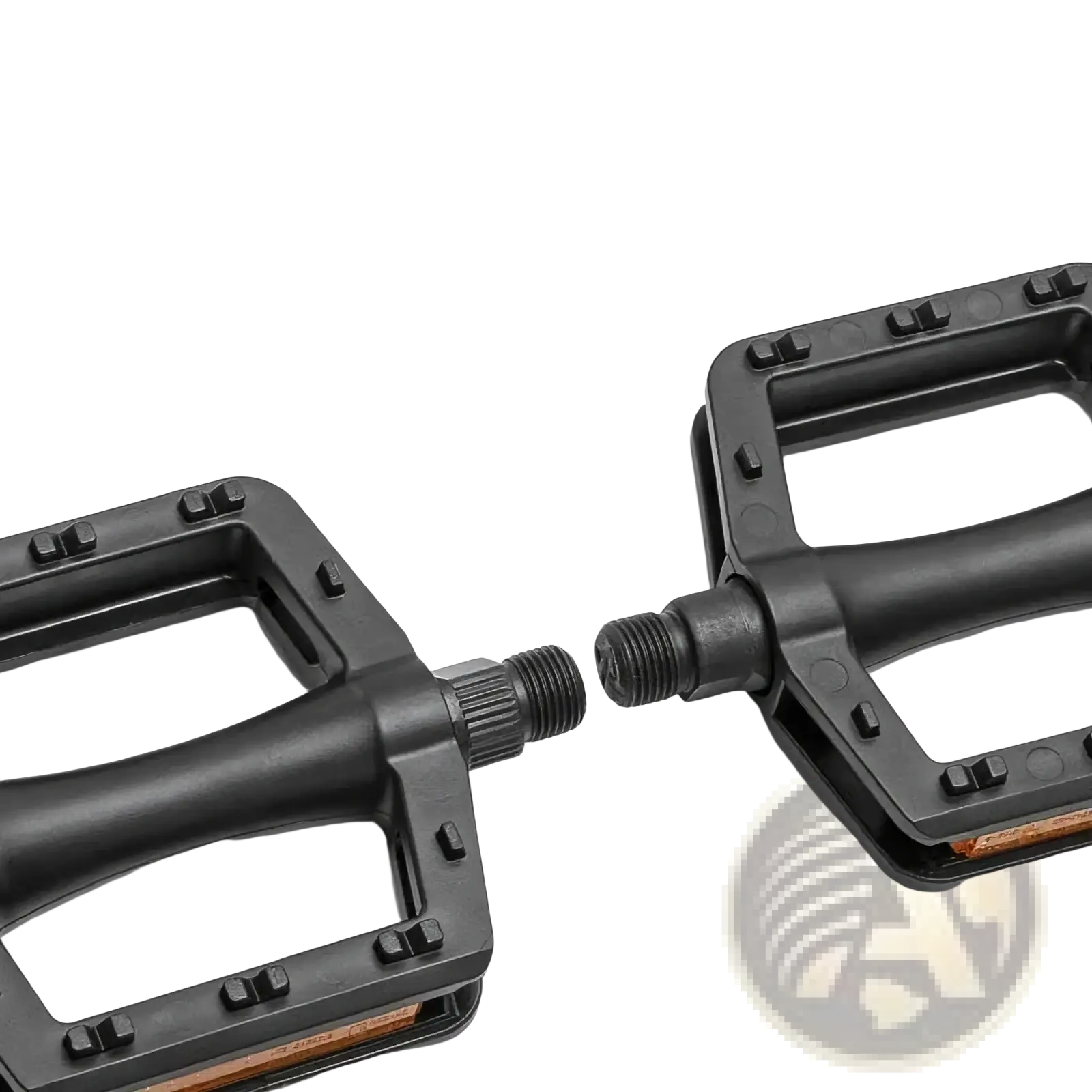 Black nylon mountain bike pedals with sturdy rectangular design and textured grip surfaces with reflectors