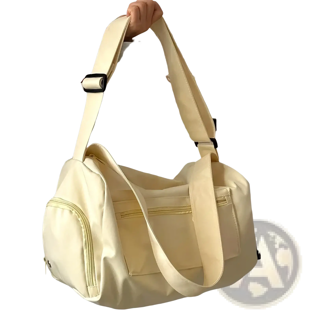 Cream-colored nylon travel tote bag with adjustable canvas shoulder strap and multiple zippered compartments for casual use