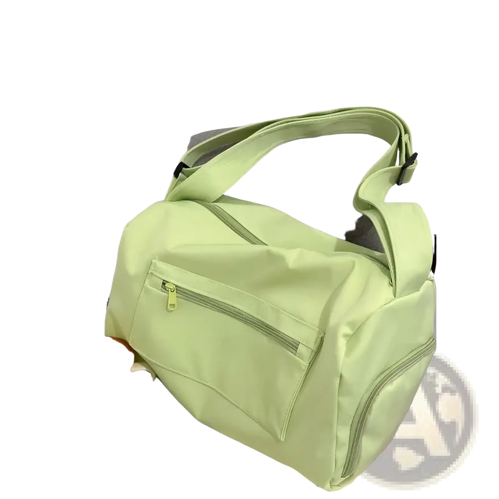 Light green nylon travel tote bag with front zippered pocket and adjustable shoulder strap for casual use