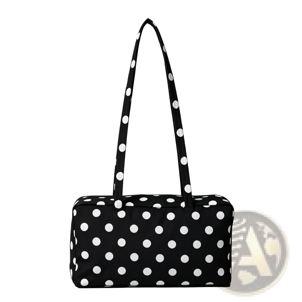 Black and white polka dot nylon travel tote bag with large capacity and zippered closure with matching handles