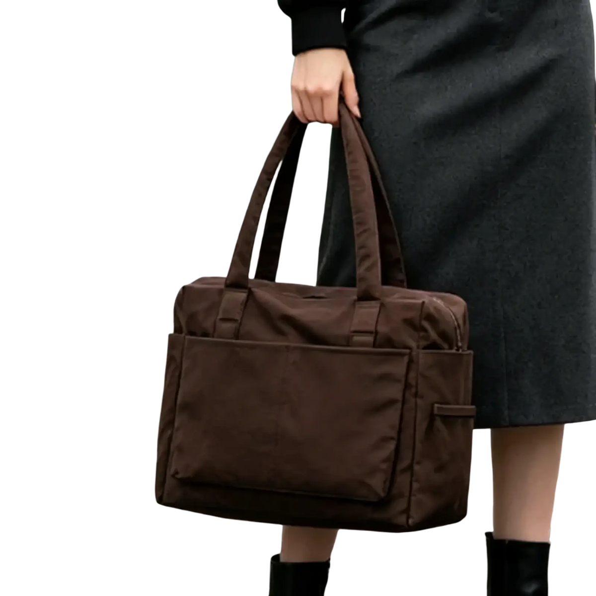 Brown nylon travel tote bag with large capacity zippered handbag featuring two top handles and multiple exterior pockets