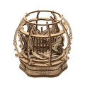 Oak puzzle toy kids game featuring an intricately designed wooden 3d spherical cage with ornate scrollwork and layered cutouts