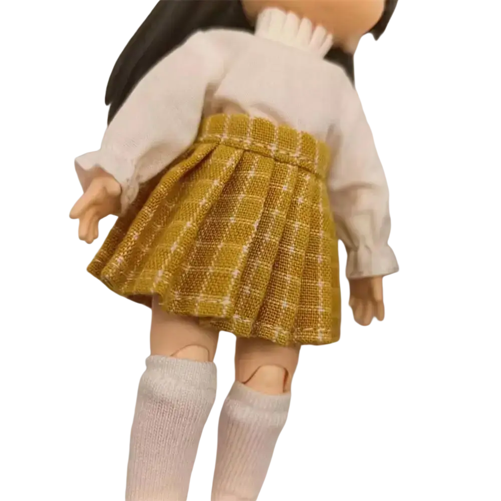 Ob11 doll pleated skirt mini school outfit in mustard yellow with white checkered pattern made of textured fabric
