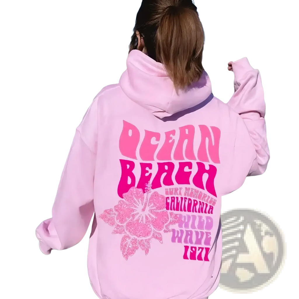 Pink oversized sweatshirt hoodie with bold pink ocean beach graphic and floral design for casual wear