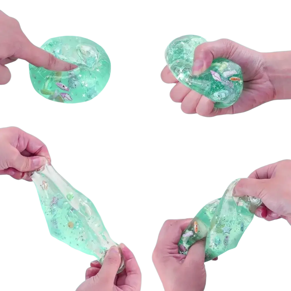Translucent green jelly-like ocean shell fidget toy squishy cube stress ball filled with glitter and sea creature figurines