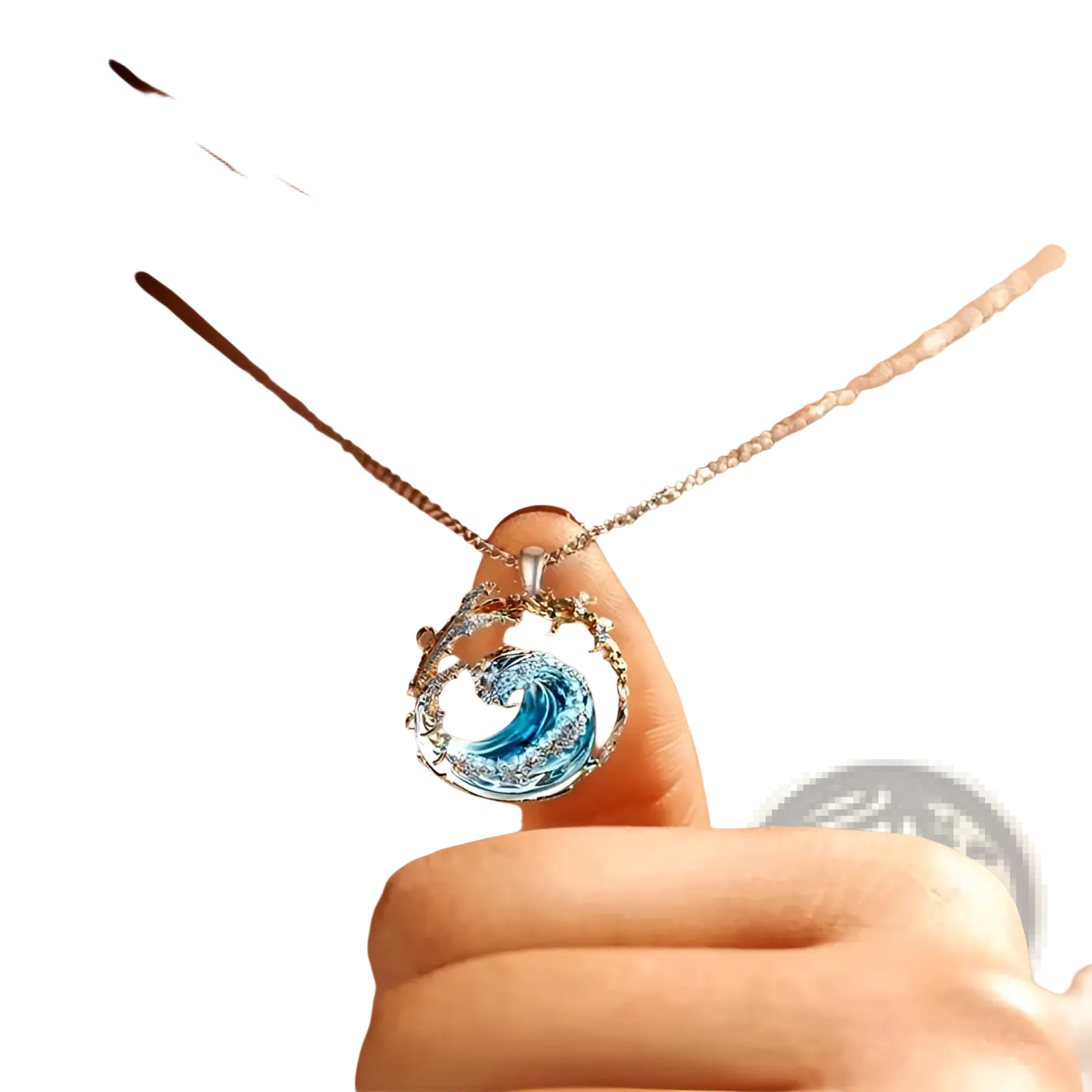 A delicate silver chain necklace with a circular ocean wave turquoise glass pendant and gold accents