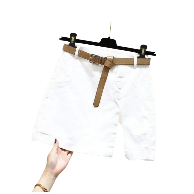 White denim office lady shorts with a tan leather belt and silver buckle designed for wide leg comfort