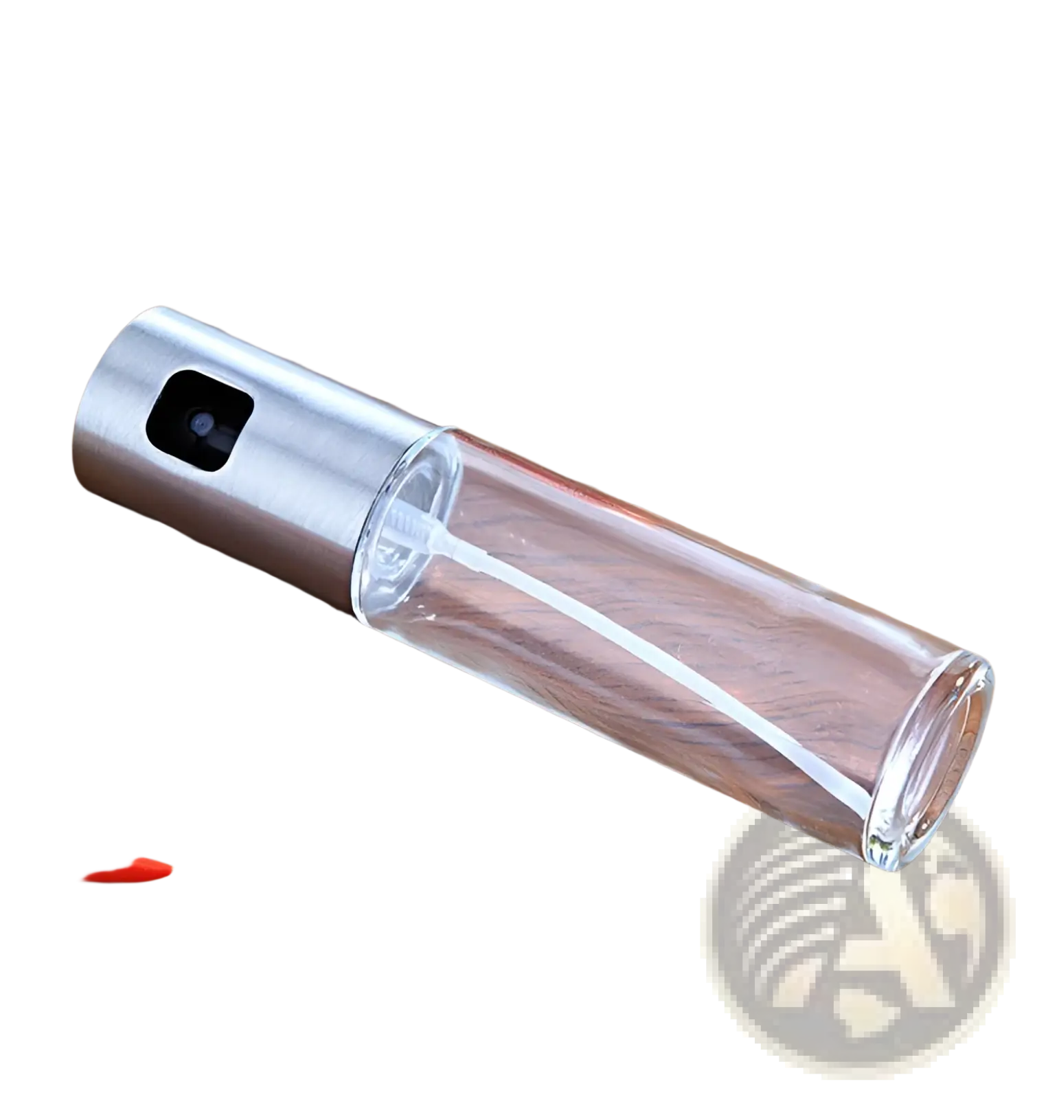Clear glass oil spray bottle with leakproof design, sleek silver metal nozzle, and black trigger for cooking use