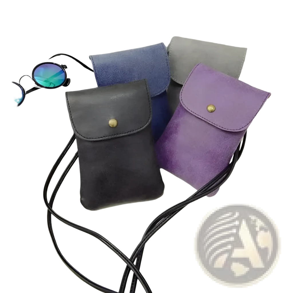 A collection of old worldly charm matte suede vegan leather crossbody bags in black purple and blue with gold snap closures