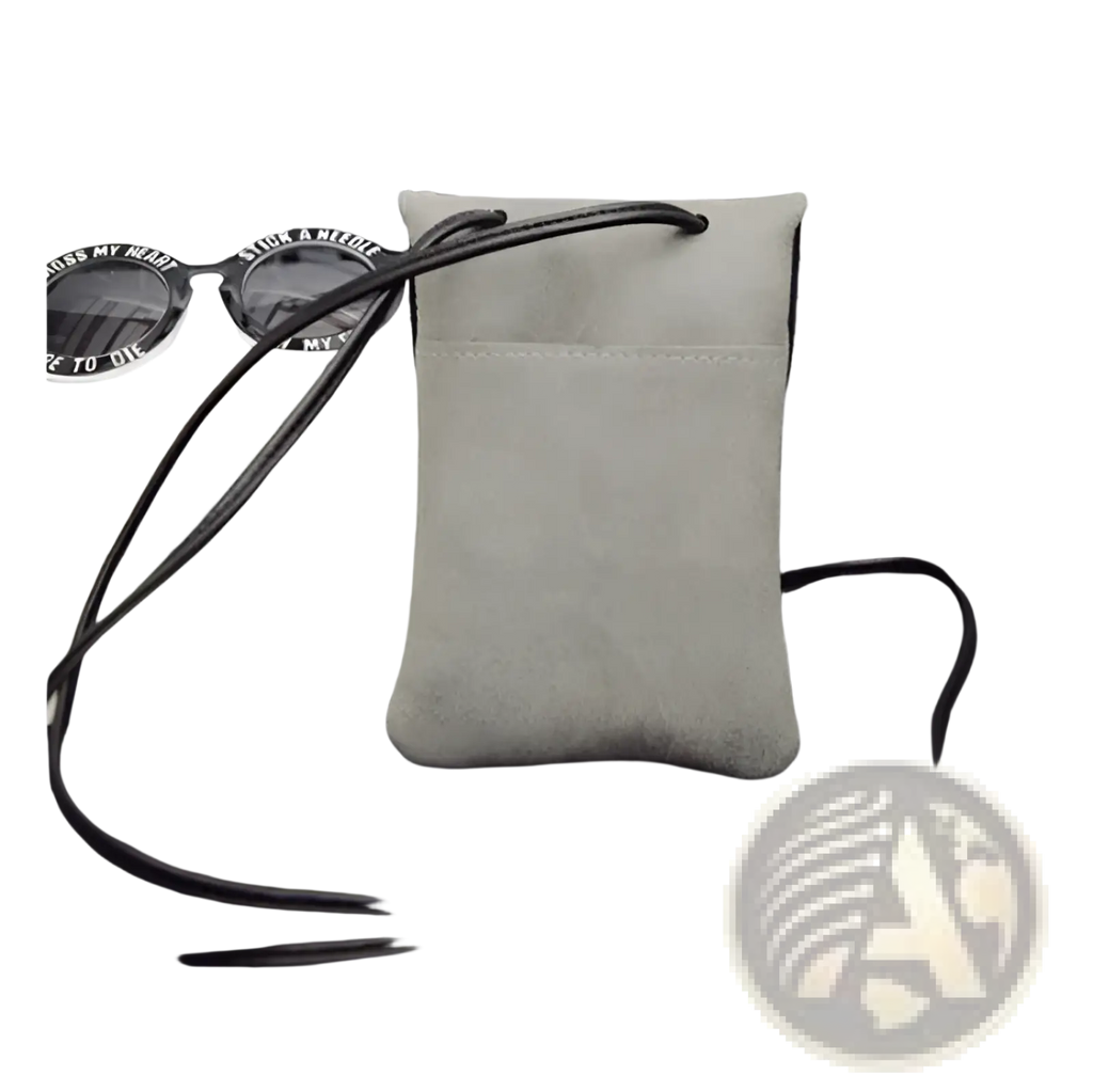 Old Worldly Charm matte suede vegan leather crossbody pouch in light gray with black adjustable strap and subtle stitching details