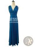 A flowing royal blue sleeveless maxi dress with deep v-neckline and cinched waistband on a mannequin for bridesmaids