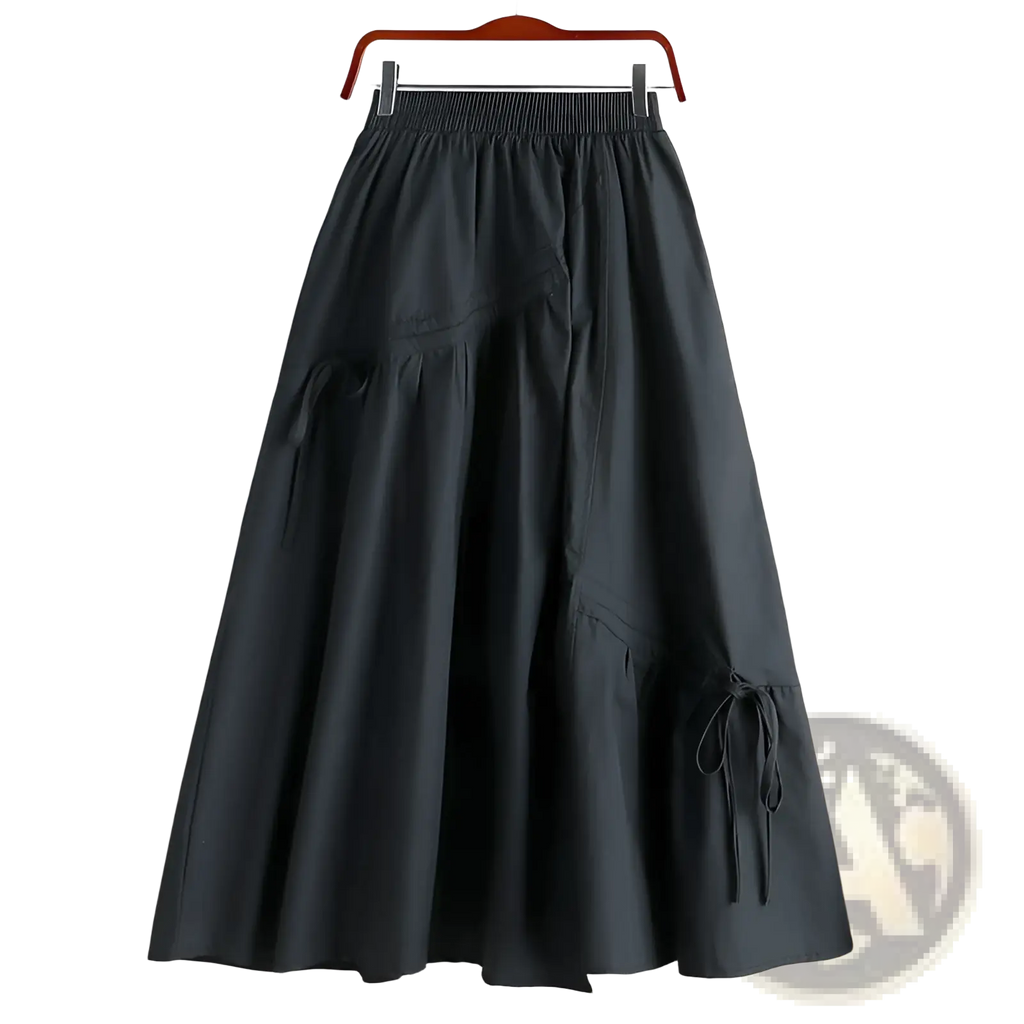 Black high-waisted a-line skirt with elastic waistband and side tie details for a stylish casual look