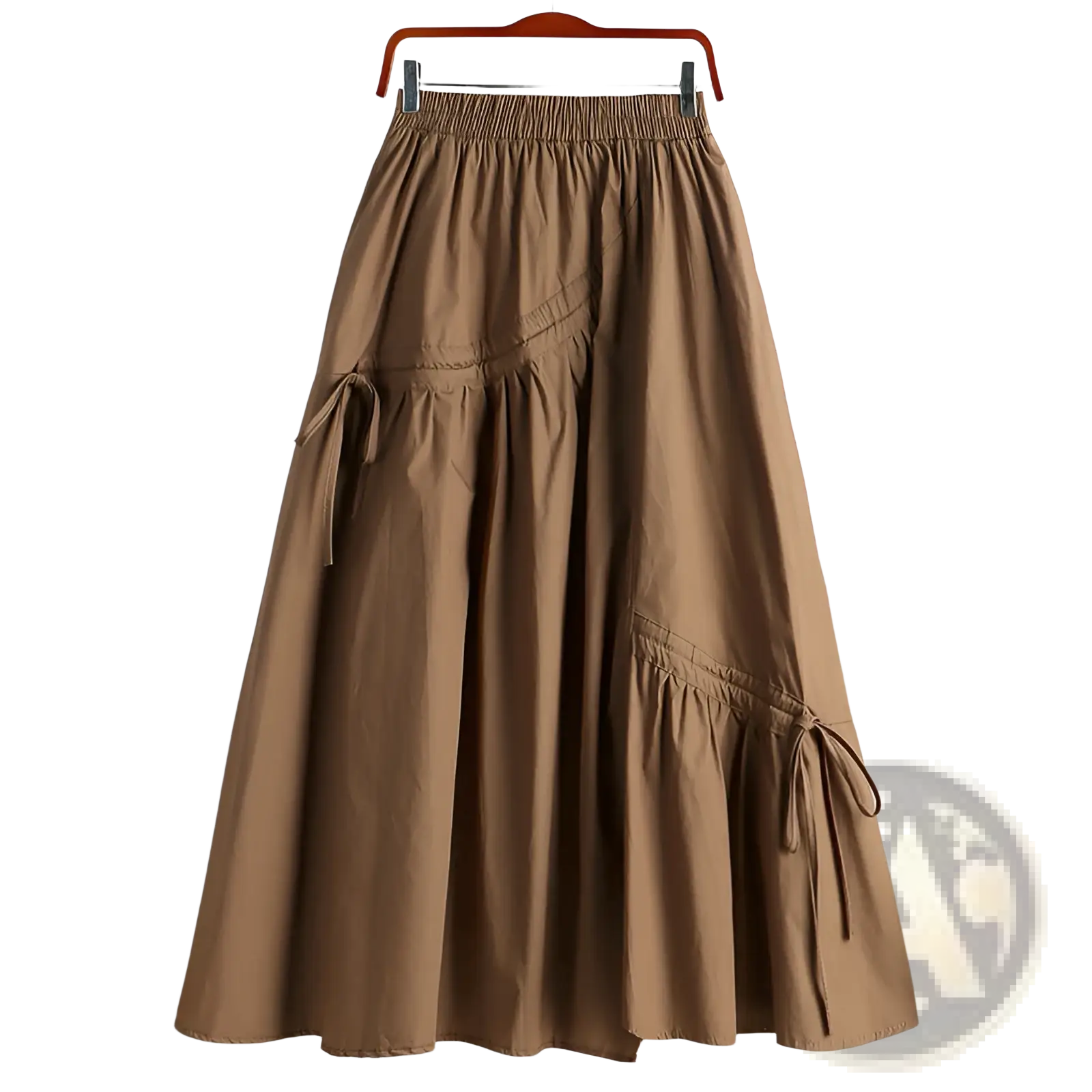 A tan a-line skirt with elastic waistband and side drawstring ties suitable for casual wear
