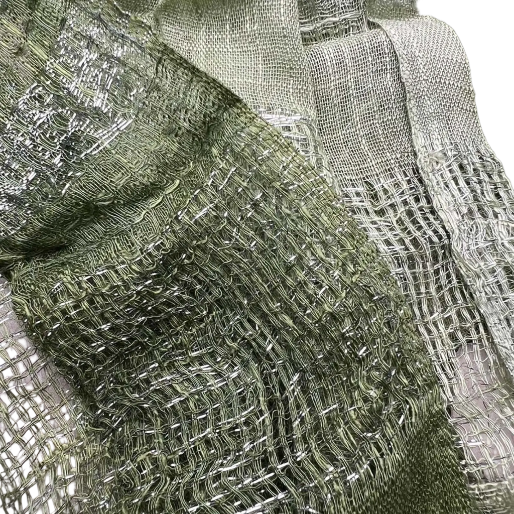 Olive green metallic shimmer scarf with a woven mesh texture showcasing its shimmering fabric design