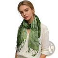 A soft olive green metallic shimmer scarf with a subtle textured pattern and fringed edges