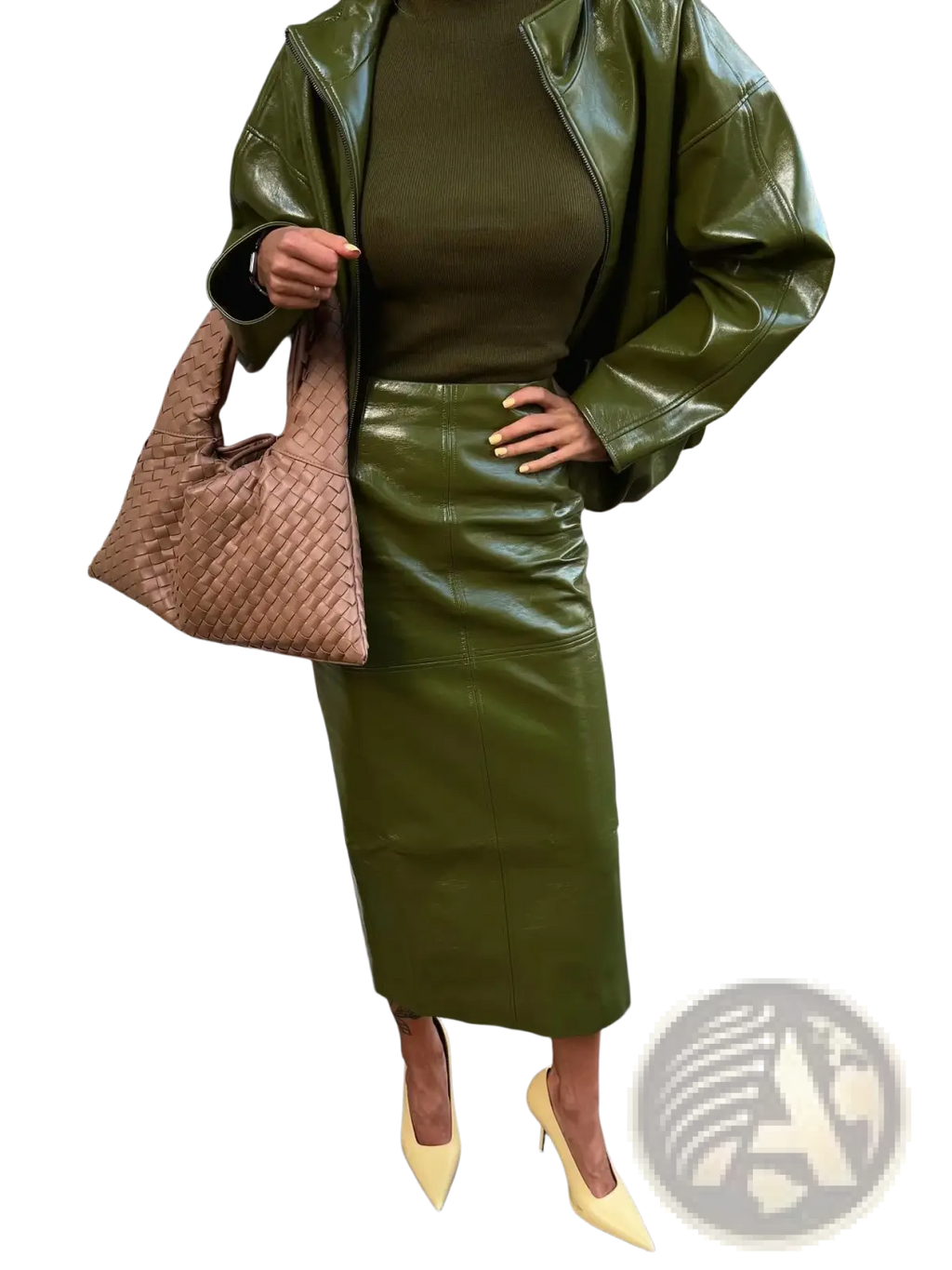 Olive green patent leather midi skirt with sleek fitted design and subtle seam detailing from jacket and skirt set