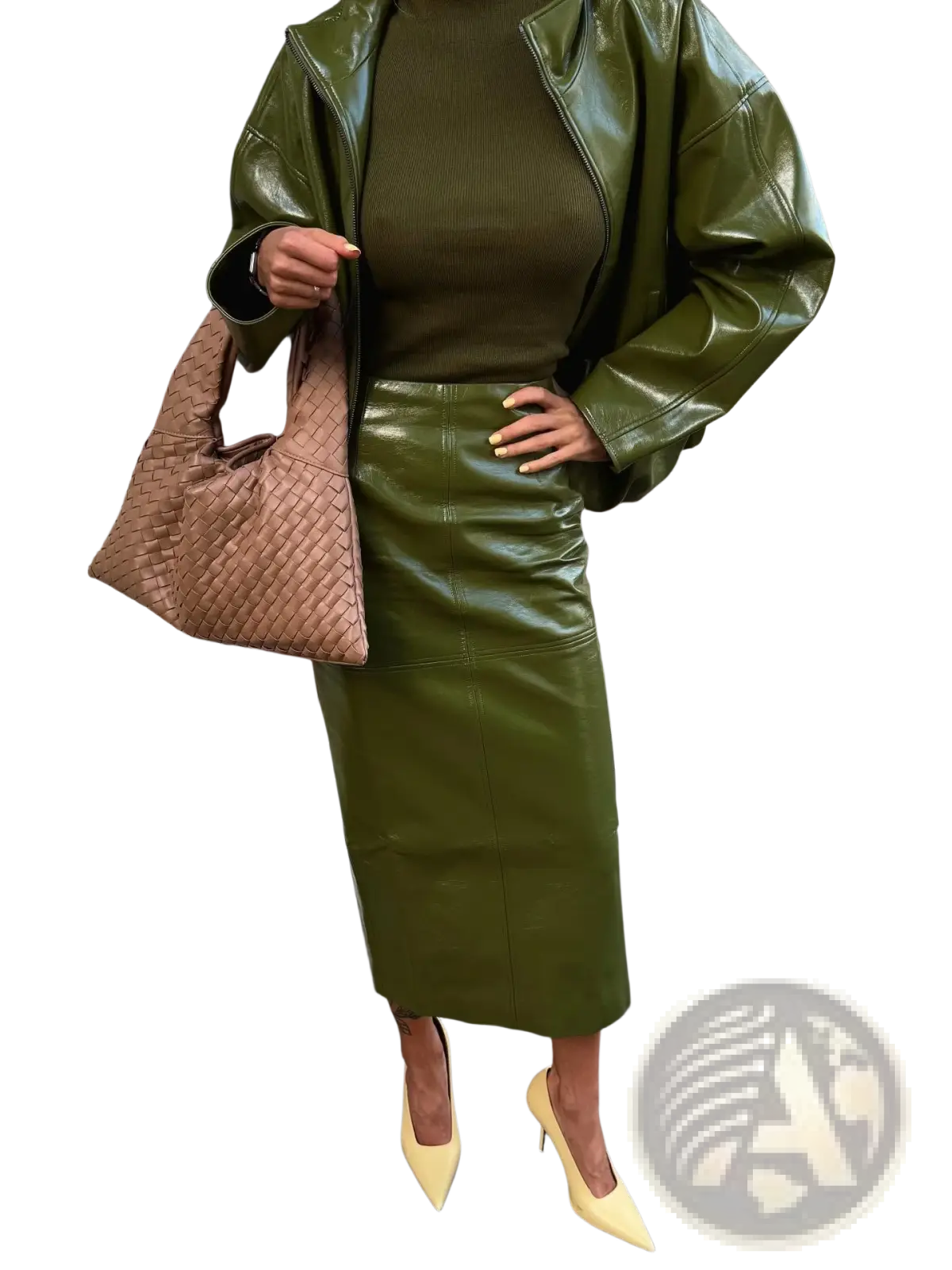 Olive green patent leather midi skirt with sleek fitted design and subtle seam detailing from jacket and skirt set