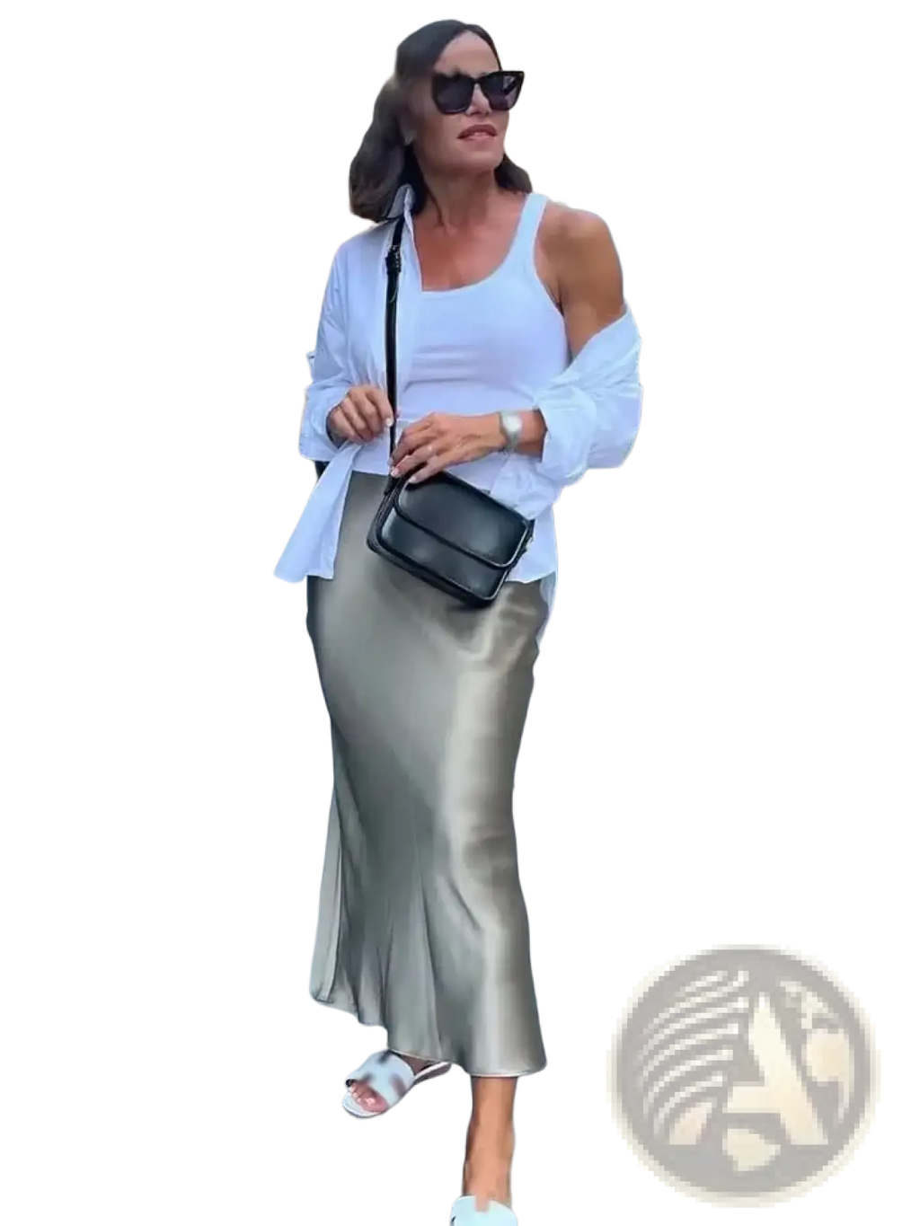 Black crossbody bag with sleek minimalist design and smooth leather texture paired with olive green satin mermaid maxi skirt