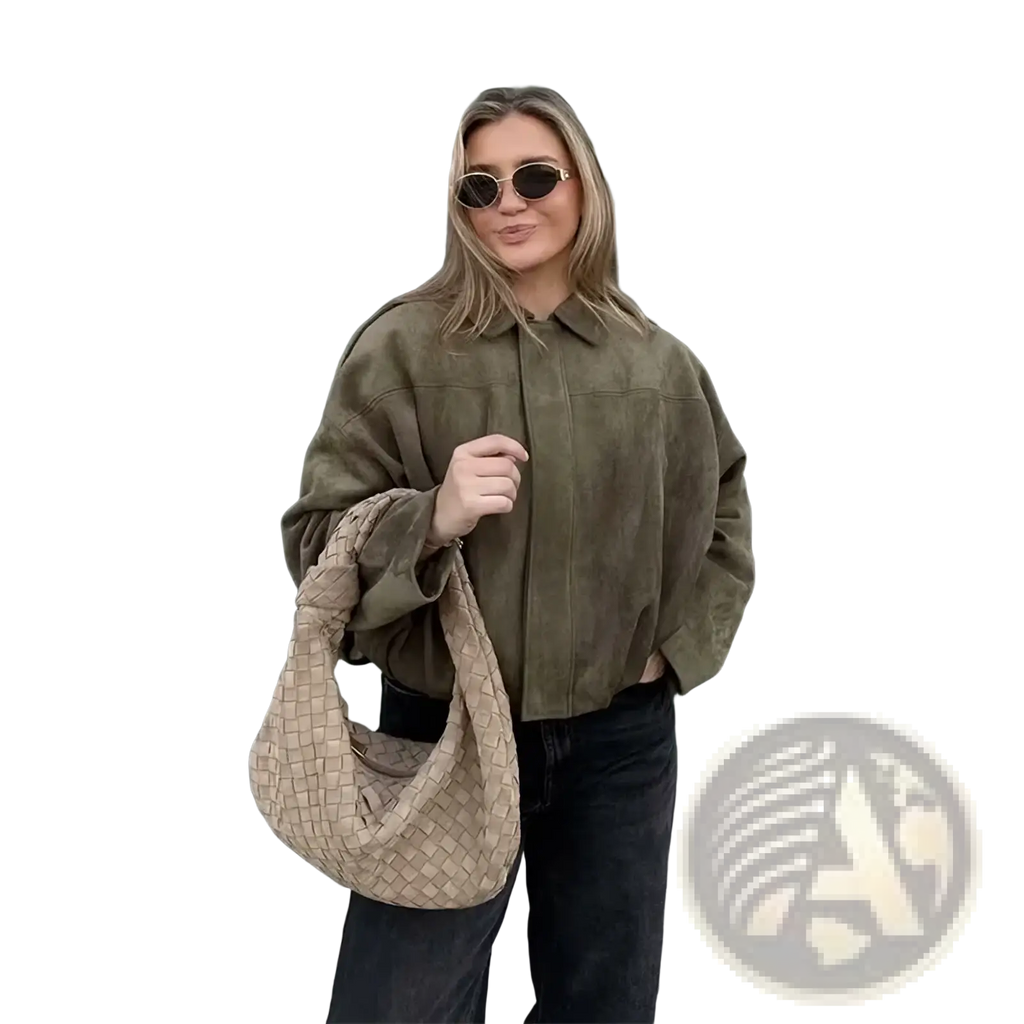 Beige woven leather hobo bag with a distinctive basketweave pattern shown with olive green suede bomber jacket