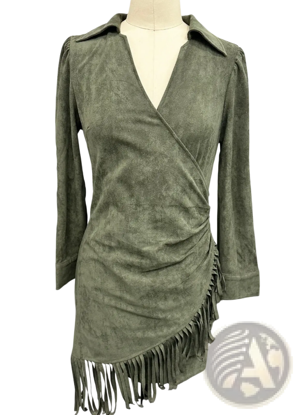 Olive green suede wrap dress with three-quarter sleeves and fringe detailing shown from the front side