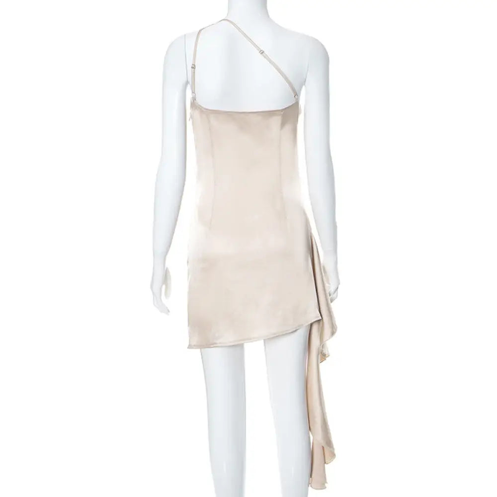Beige satin ruched one shoulder backless mini dress with asymmetrical side draping and slip-style design