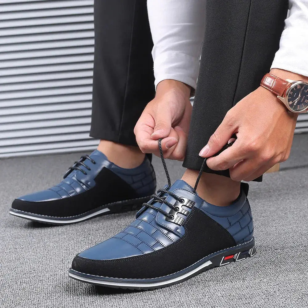 Men’s british two-tone blue and black leather lace-up dress shoes with textured toe cap pattern