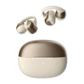 Cream and gold open ear clip bluetooth earbuds with touch control in a sleek dual-tone charging case