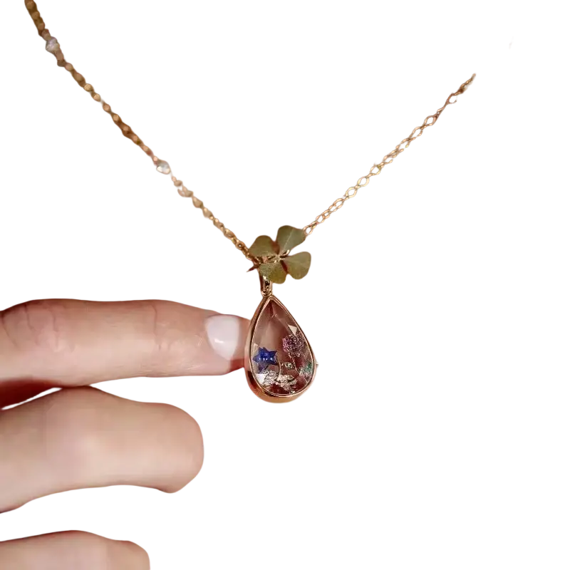 Gold-toned open pendant necklace for women girls simple fashion with teardrop locket and clover charm inside clear glass