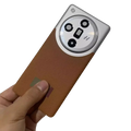 A sleek tan leather back cover repair replace for oppo find x7 featuring a silver circular multi-lens camera module