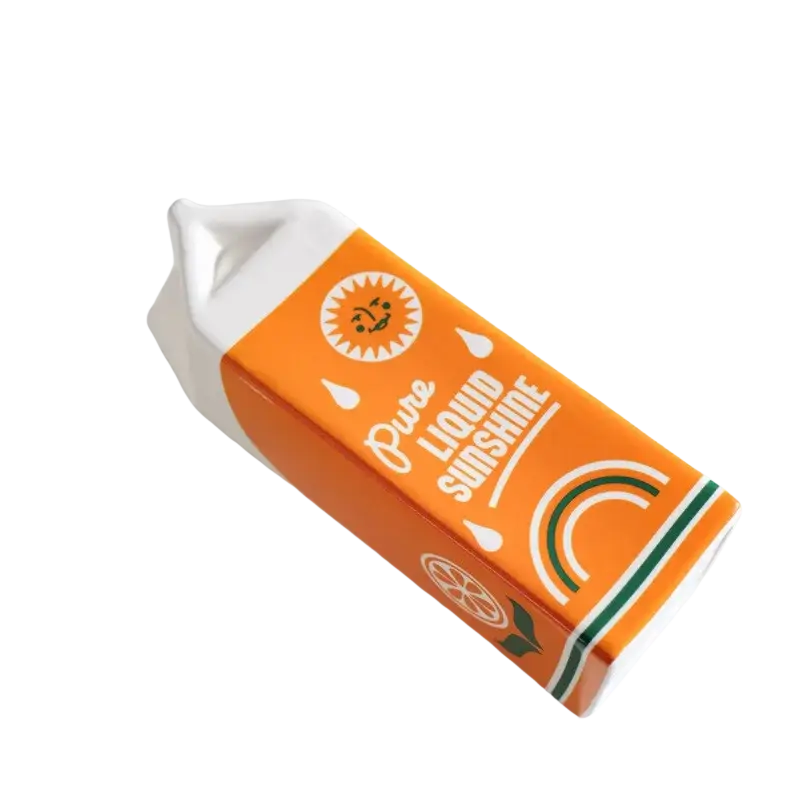 Orange juice carton ceramic vase in orange and white with a smiling sun logo and green stripe citrus design