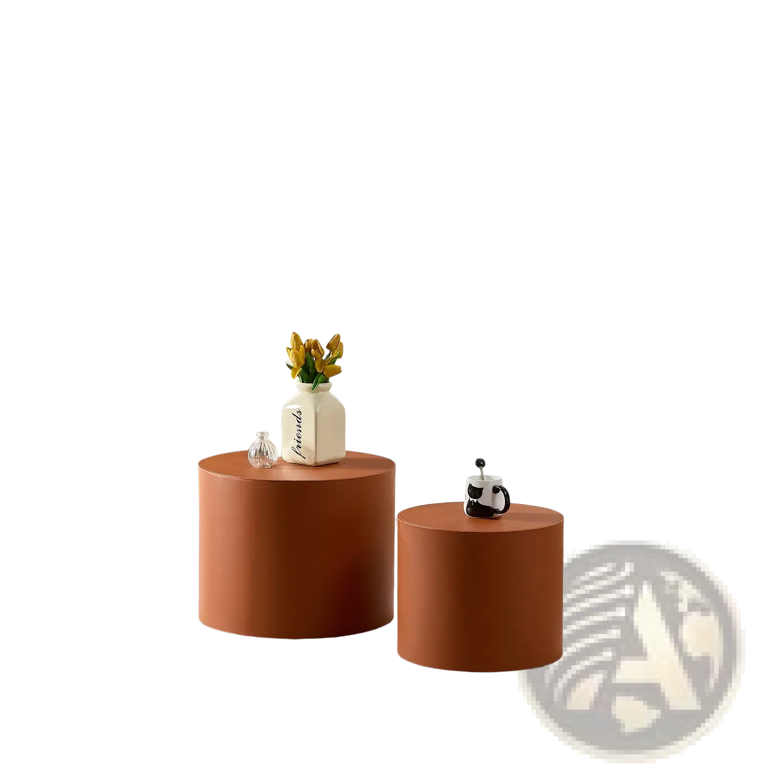 Two terracotta cylindrical coffee tables with smooth matte finishes in the orange saddle leather round coffee table set
