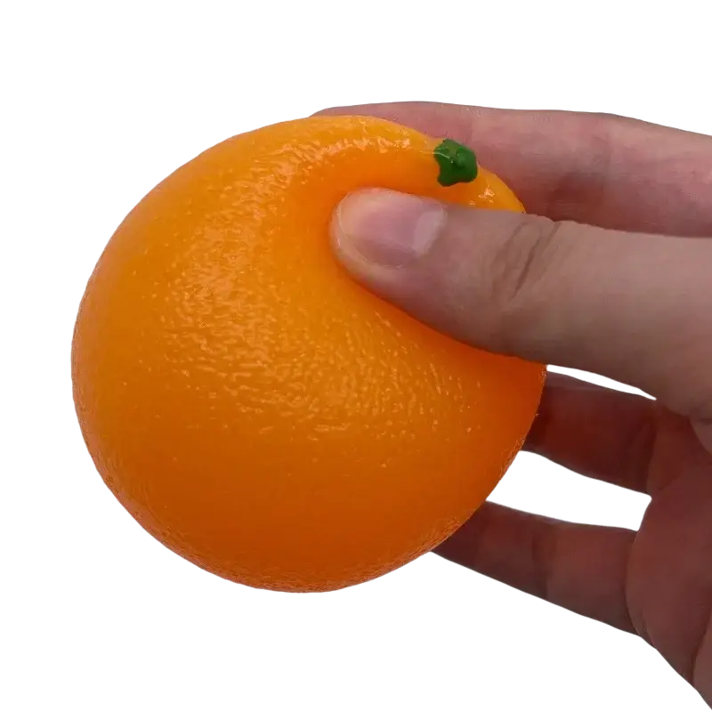 A bright orange silicone stress ball with textured surface and small green stem for sensory fidget use