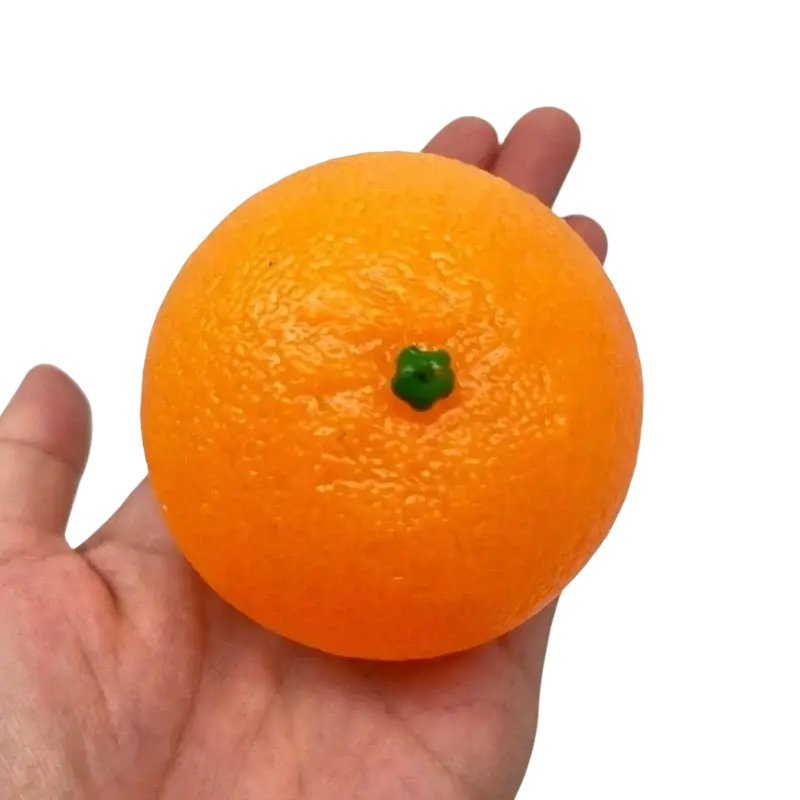 Orange silicone stress ball sensory fidget toy 6cm in diameter with vibrant orange citrus fruit design