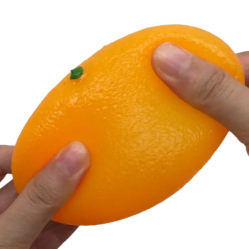 Vibrant orange silicone stress ball sensory fidget toy with a small green leaf detail for sensory relief