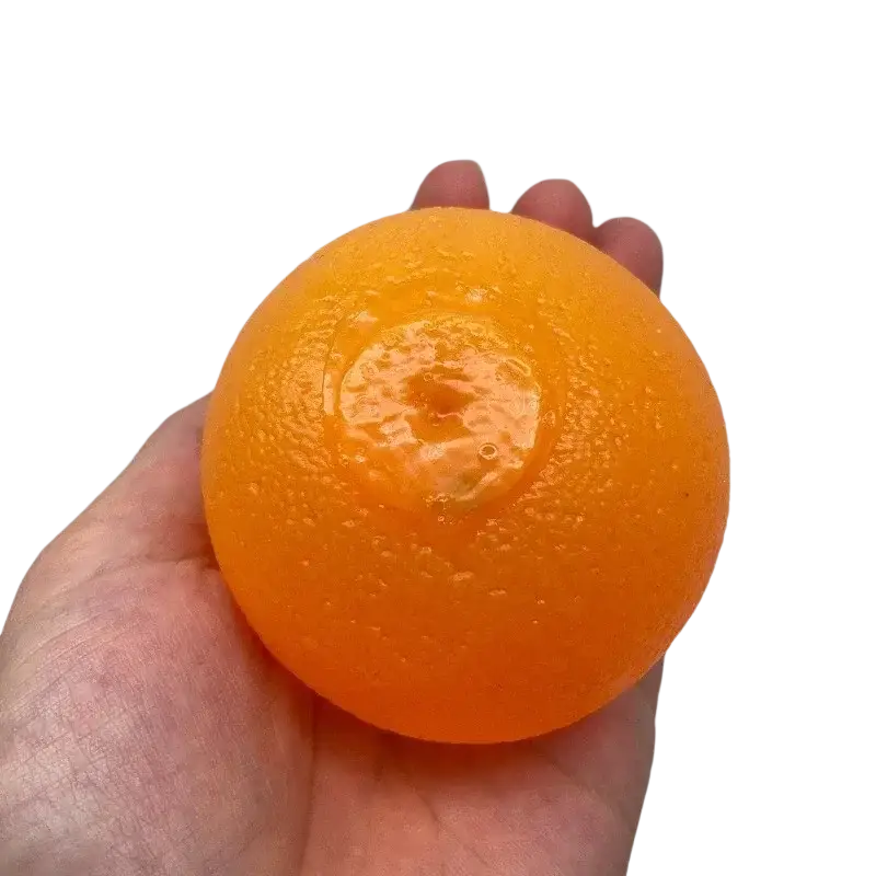 Orange silicone stress ball sensory fidget toy with vibrant color and textured dimpled surface resembling a citrus fruit